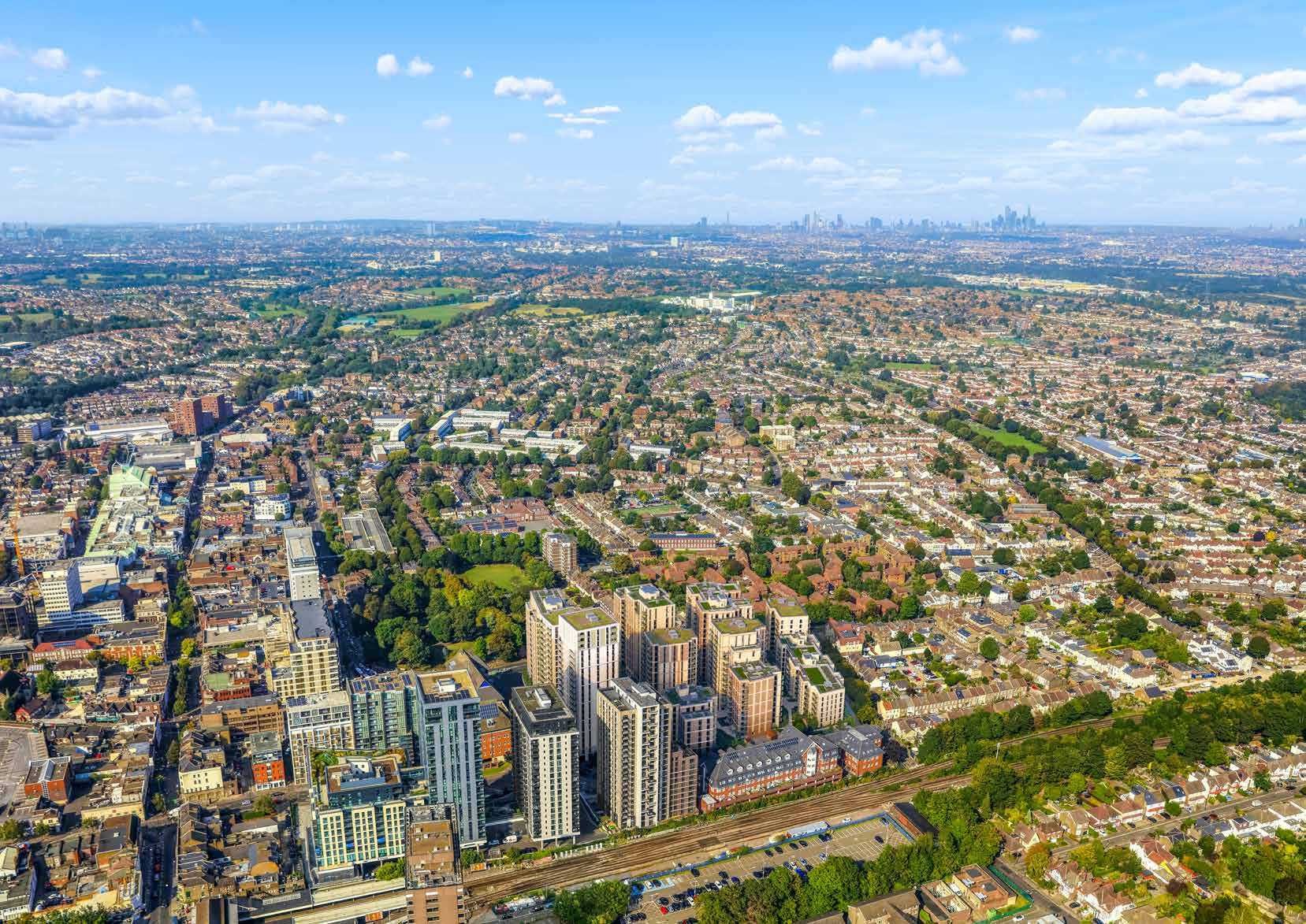 Aerial view over Sutton towards the City of London