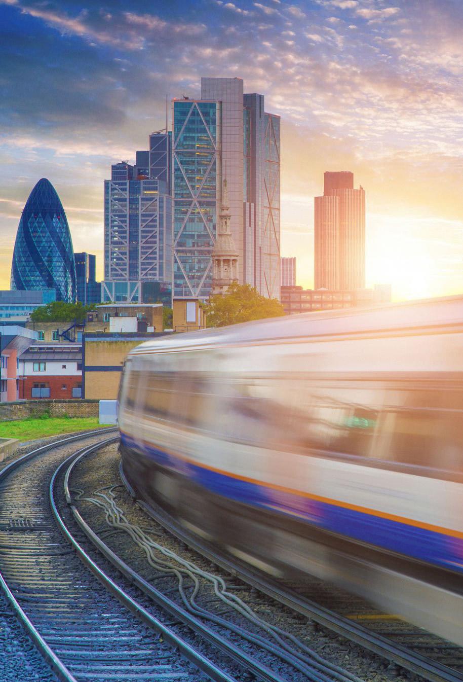 Train heading towards the City of London skyline